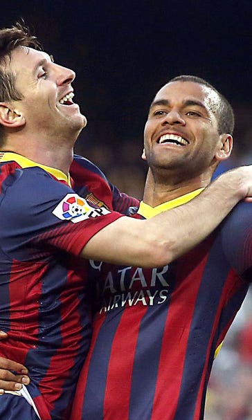 Lionel Messi's record-breaking hat trick leads Barca past Osasuna